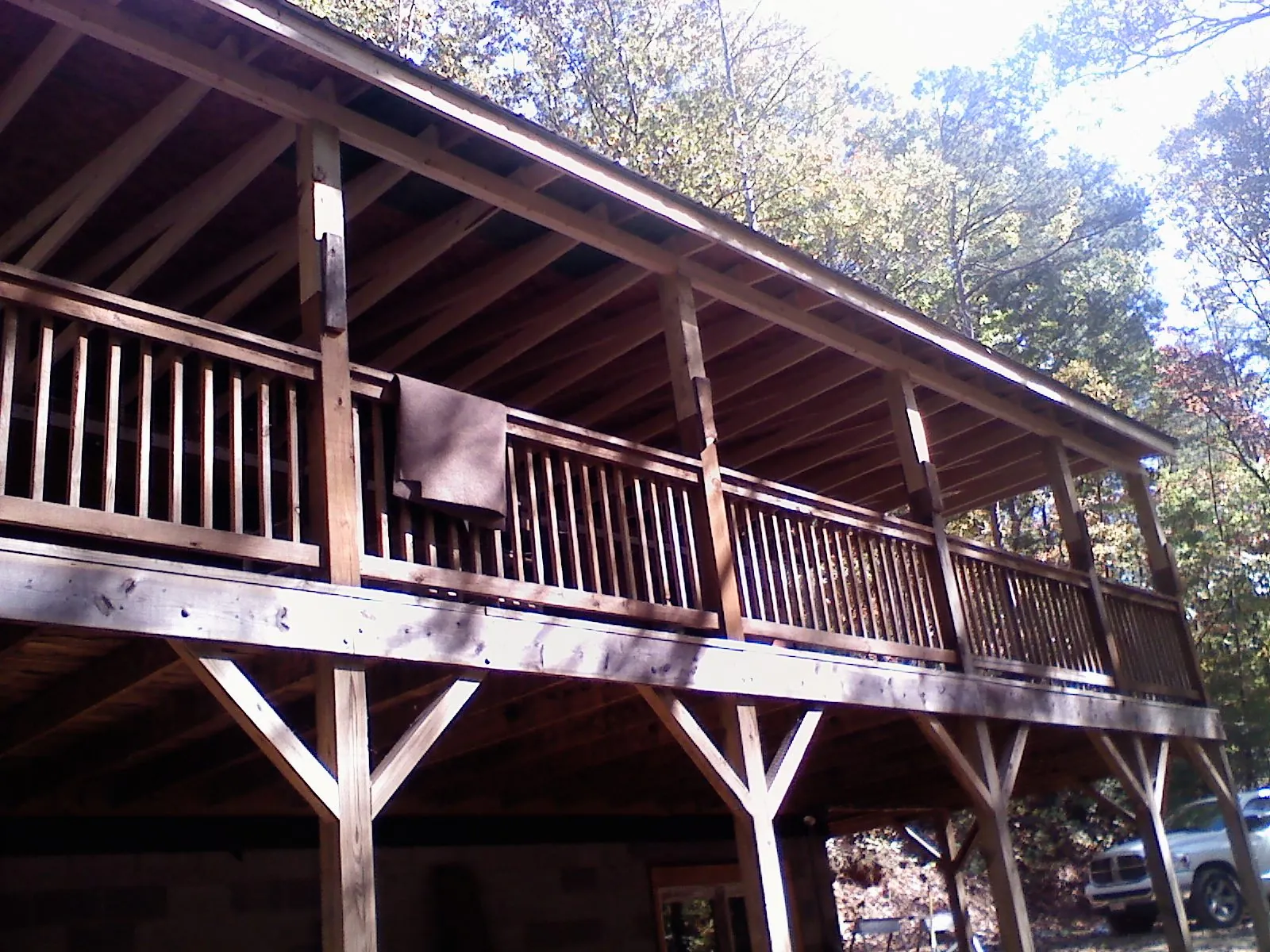 Timber framing under a new elevated porch and deck — Roof Leak Repair in Van Etten by Roofing Brothers